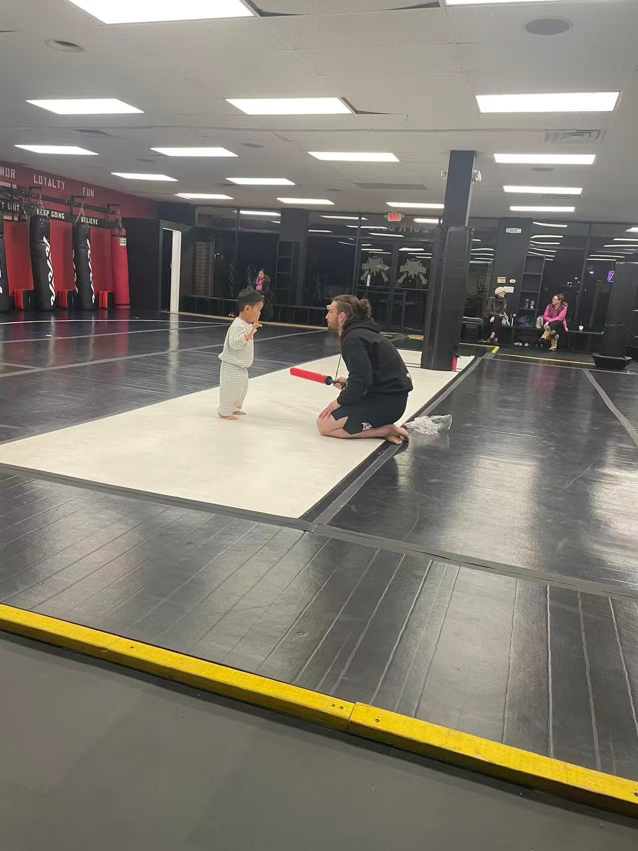 Lev MMA foam baton coach drill